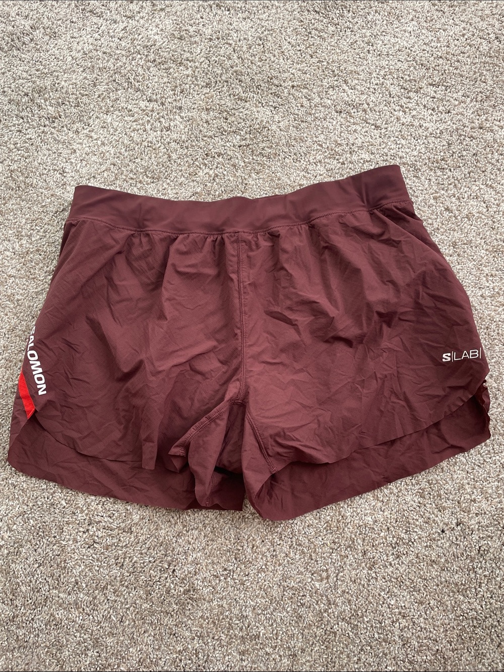 Salomon women’s S/LAB Speed Short 3" - size Large, color maroon